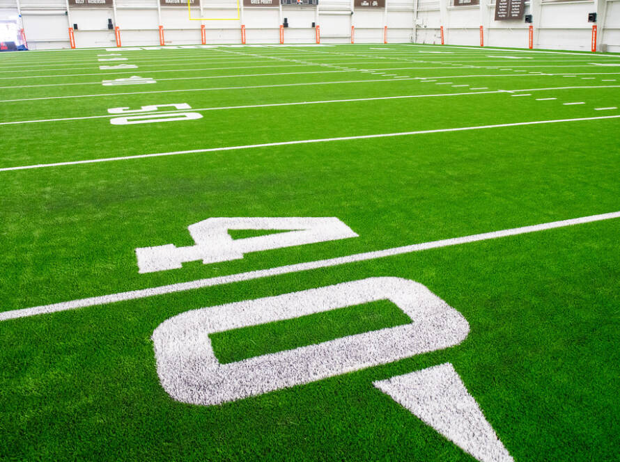 Fake grass on athletic field