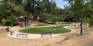 Artificial grass on park with benches